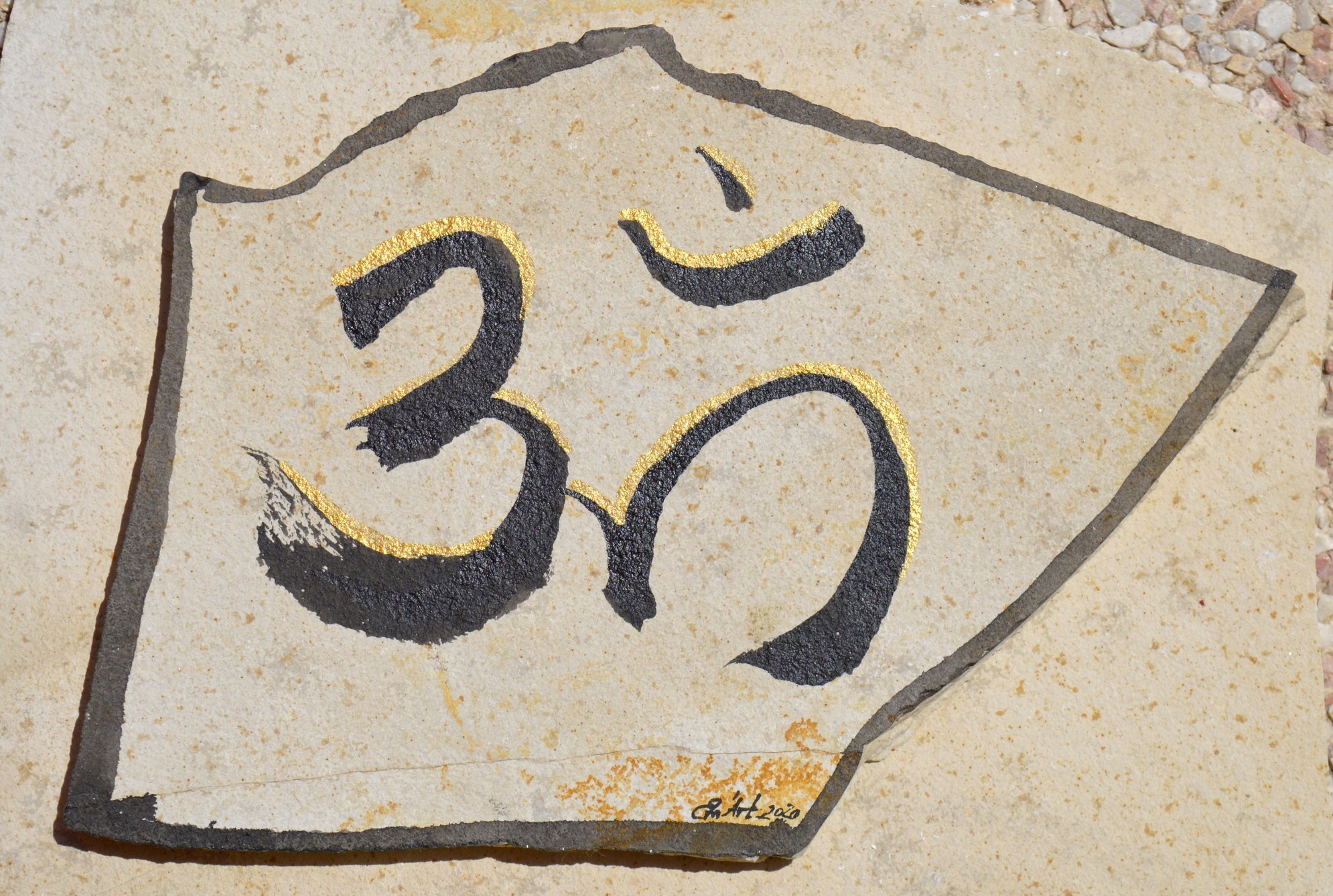 Aum I, india ink on flat stone by Emmanuelle Baudry